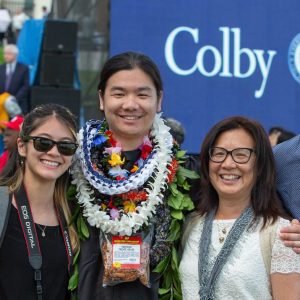 Colby students and families taking pictures post-ceremony at Commencement 2019.