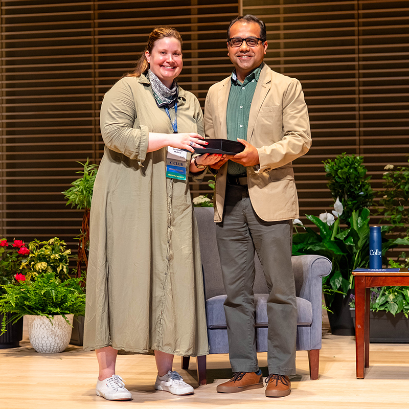 2026 Charles W. Bassett Faculty Award recipient Tariq Ahmad (right) poses with Catherine Mullin ’11, chair of the award selection committee.