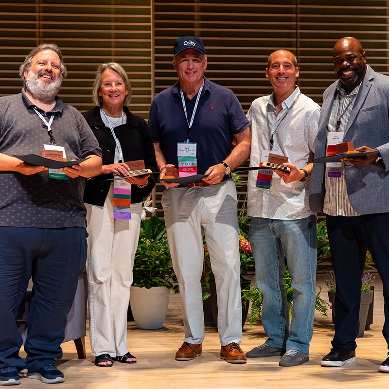 2026 Brick Award recipients (left to right) Robert A. Weinstein ’76; Susan R. Parker ’76, P’01, ’06, ’09; Jackson A. Parker ’76, P’01, ’06, ’09; Jason S. Freedman ’01; and Coy R. Dailey ’01 pose with their awards.