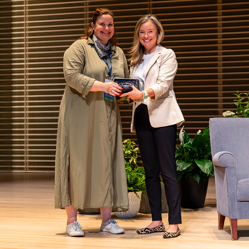 2026 Outstanding Educator Award recipient Amy Bonnefond Smucker ’01 (right) poses with Catherine Mullin ’11, chair of the award selection committee.